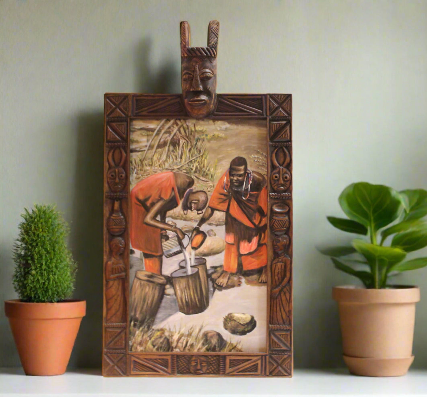 African Tribal Art with Caved Wood Frame