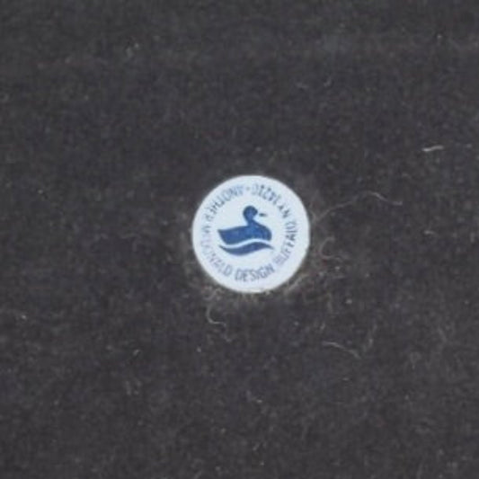 Chrome-colored Metal Bookends by Another McDonald Design Buffalo, N.Y, label