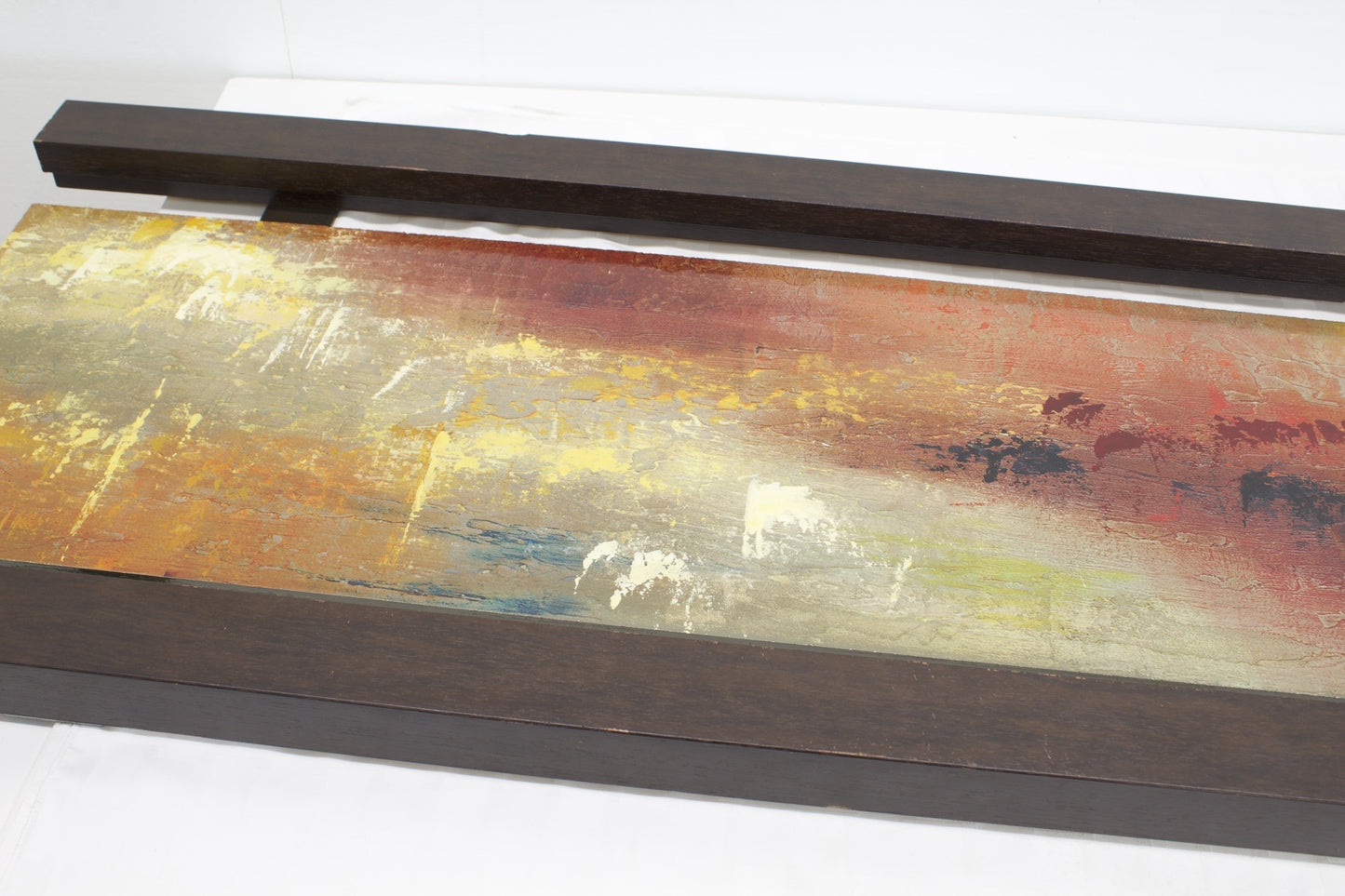 Abstract Wall Art with wood accent on top and bottom to frame it