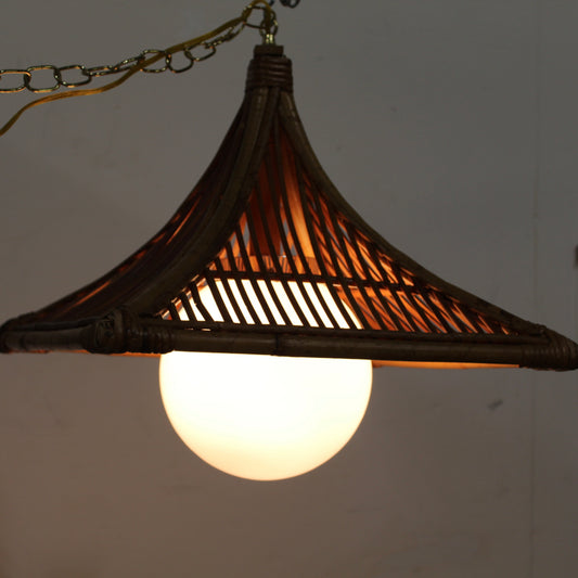 Large square bamboo frame over a white glass orb light.