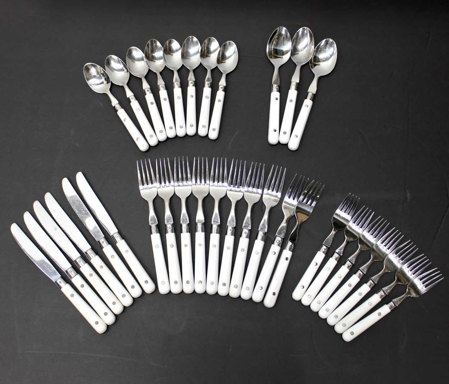 34 pc. Vintage White Riveted Handle Flatware