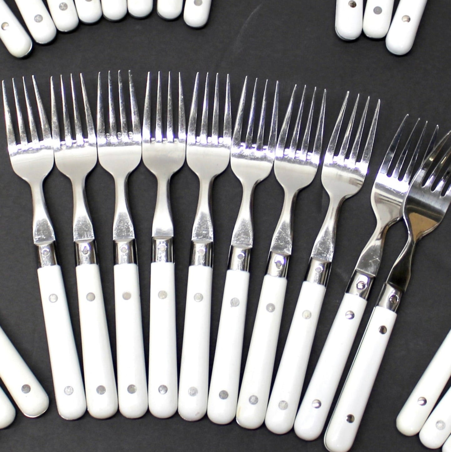 34 pc. Vintage White Riveted Handle Flatware