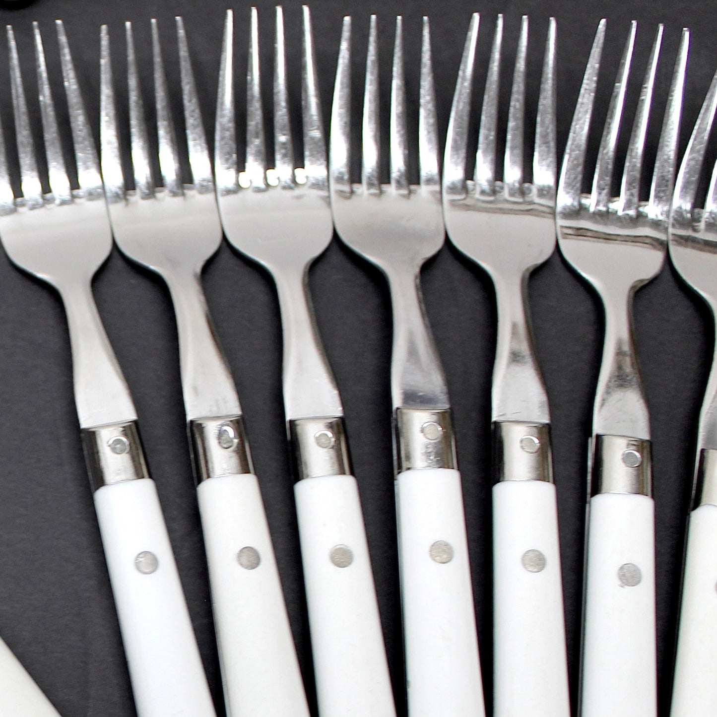 34 pc. Vintage White Riveted Handle Flatware