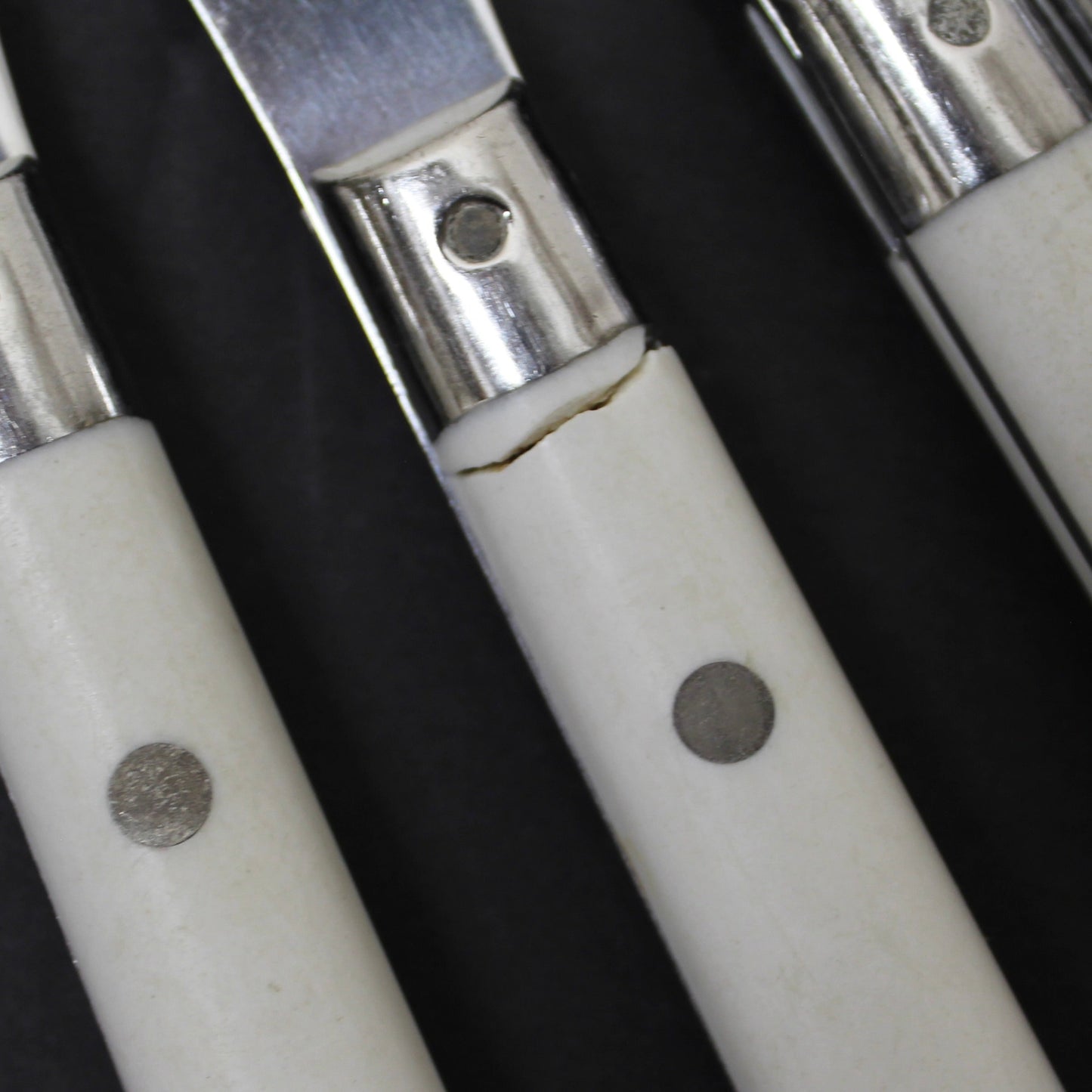 34 pc. Vintage White Riveted Handle Flatware