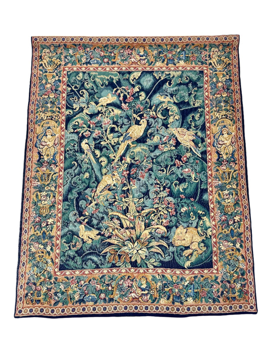 large tapestry of birds surrounded by small animals. edging has endglish countryside scene
