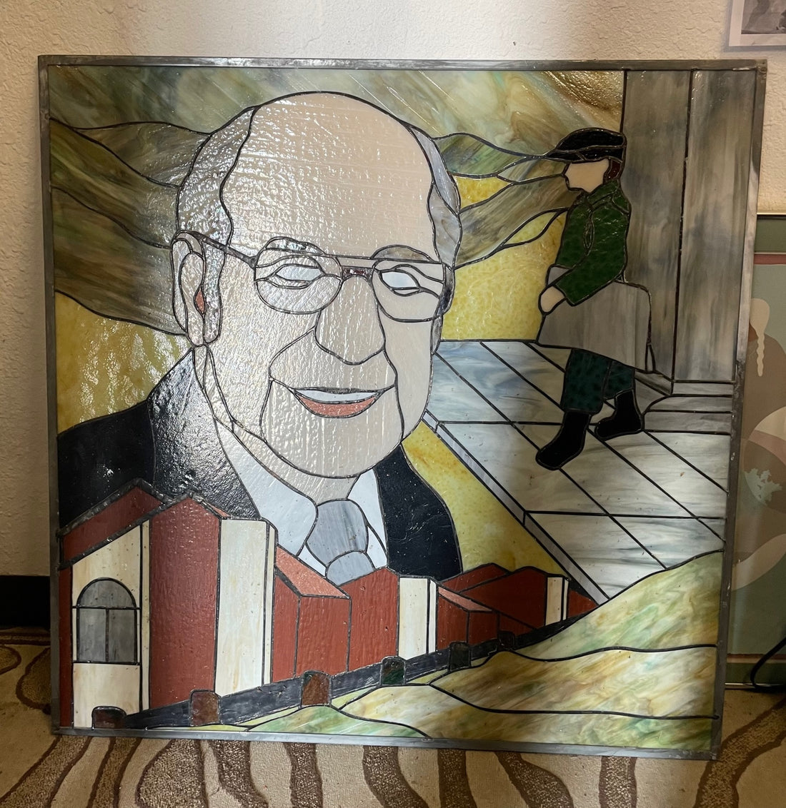 Stained Glass of Bald White Guy or Another Paperboy of the Depression Makes Good