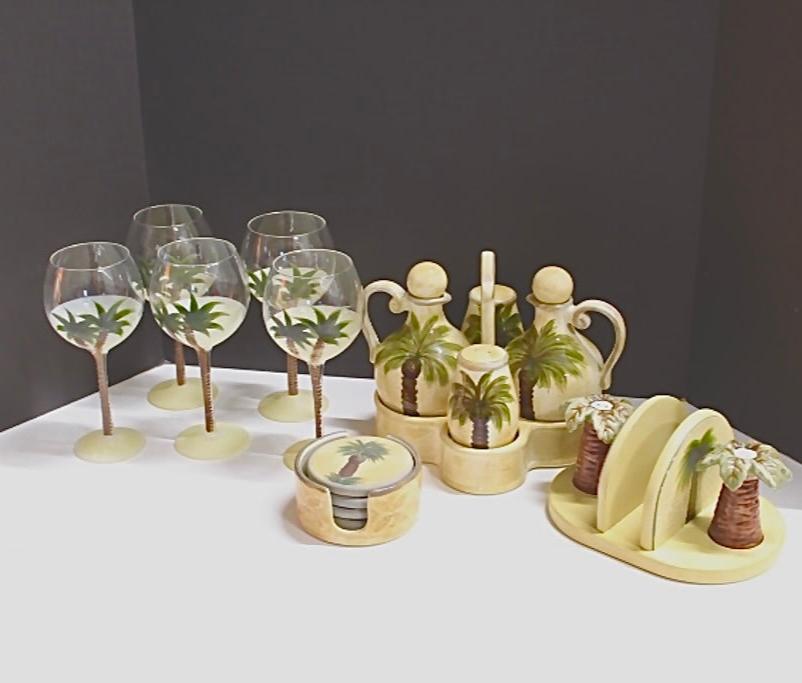 Coasters, wine glasses, napkin holder, vinegar and oil bottles, salt and pepper shakers