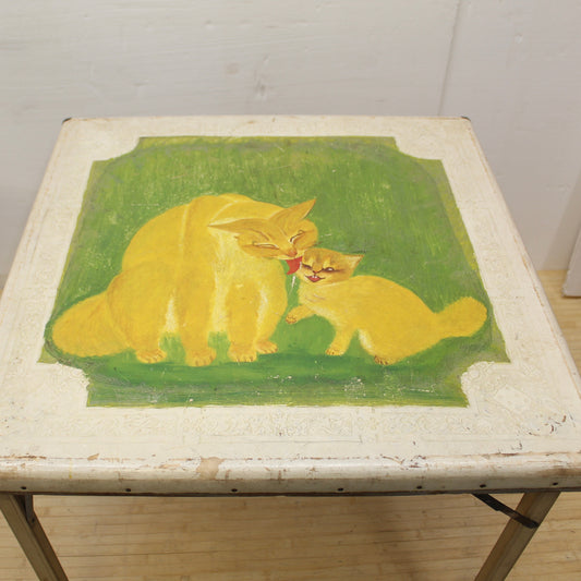 1930 folding wood card table with cat lithograph and a embossed tin fiberboard top. 1930s Shwayder Bros folding Card table. 