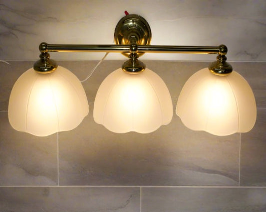 3 light brass and glass Wall Sconce,  3 light bathroom vanity.