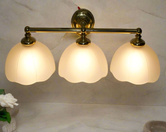3 light brass and glass Wall Sconce, 3 light bathroom vanity.