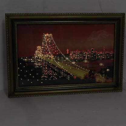 Close-up of the lighted cables on a vintage SF Bay Bridge moving picture. Internal motorized lights create a sparkling twinkle