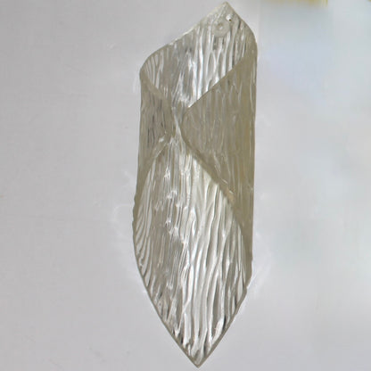 Decorative wall sconce dangle made of acrylic with textured design 