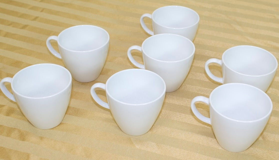 7 pc White Corning ware Coffee Cups.