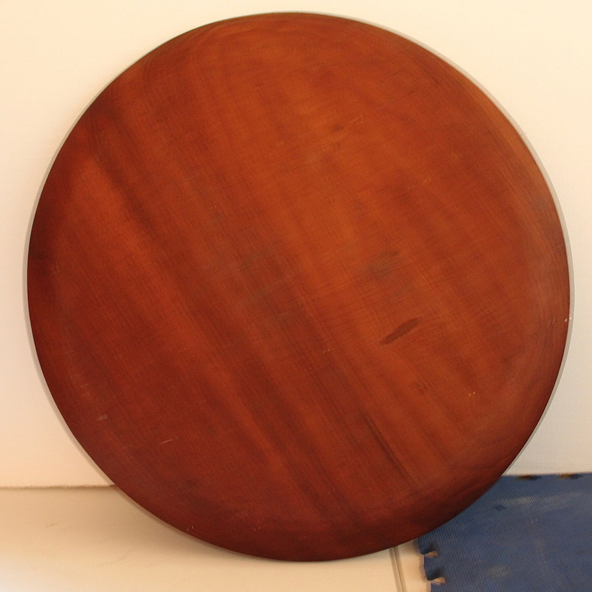 Giant 27.5-inch round wooden serving tray.