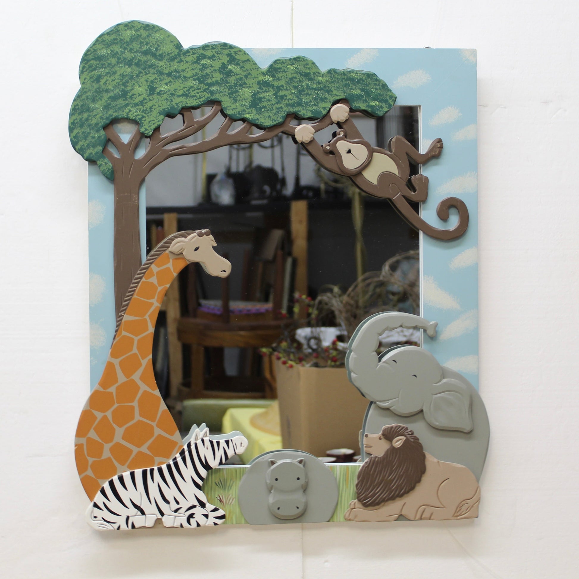 Vintage Home Interiors Kids 3D wooden safari mirror featuring a monkey, giraffe, zebra, and lion for nursery wall decor