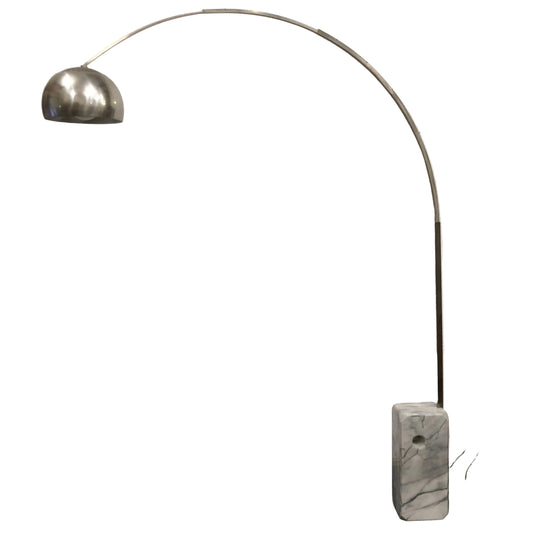 Arc floor lamp with metallic shade and marble base on a white background