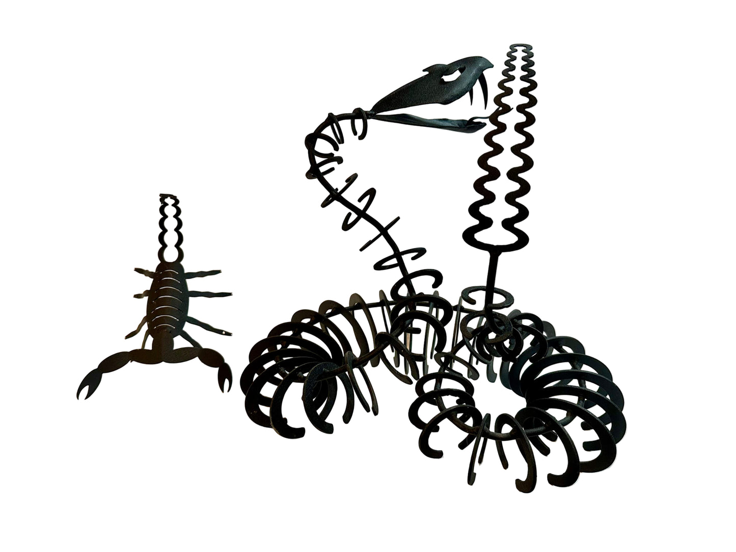 Black metal iron sculptures of scorpion and snake 