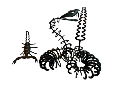 Black metal iron sculptures of scorpion and snake 