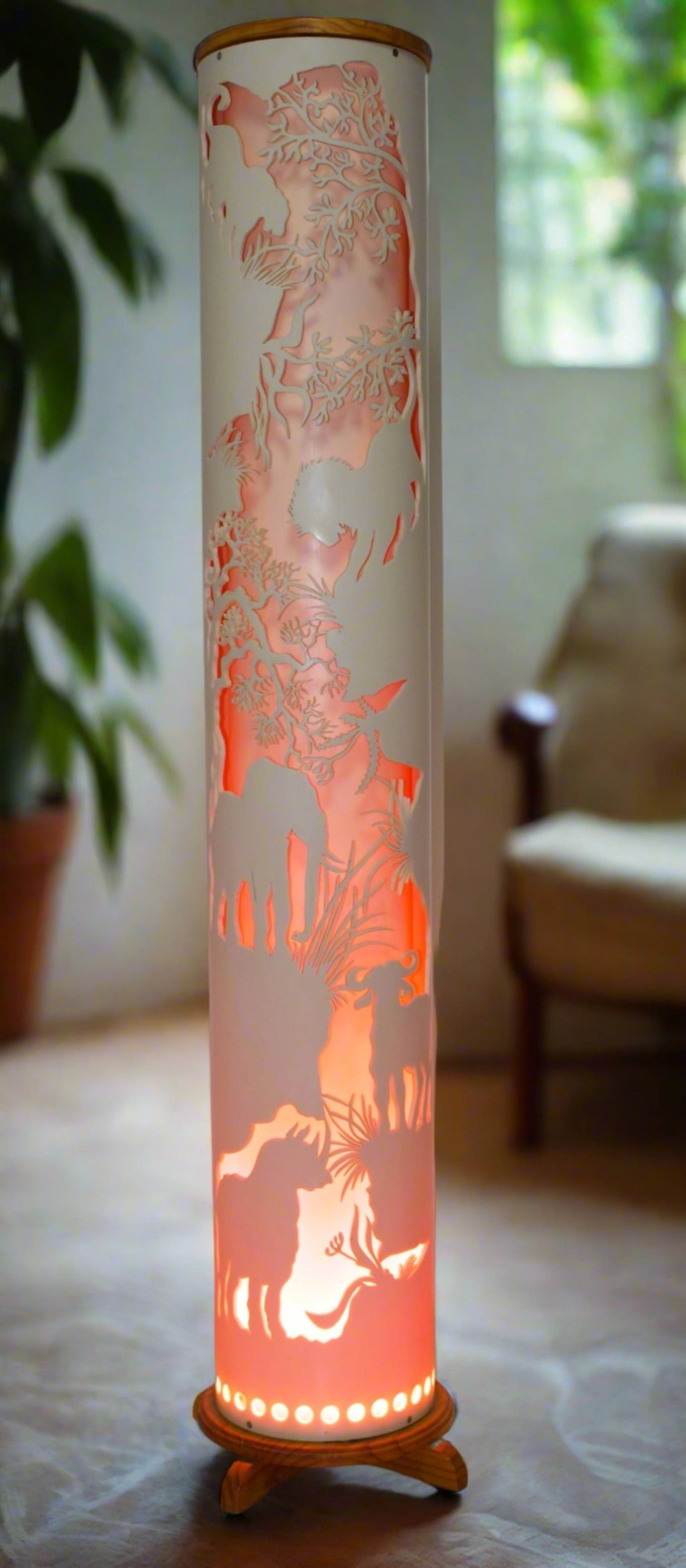 Handmade Pillar Floor lamp With a Jungle scene cut into the shade