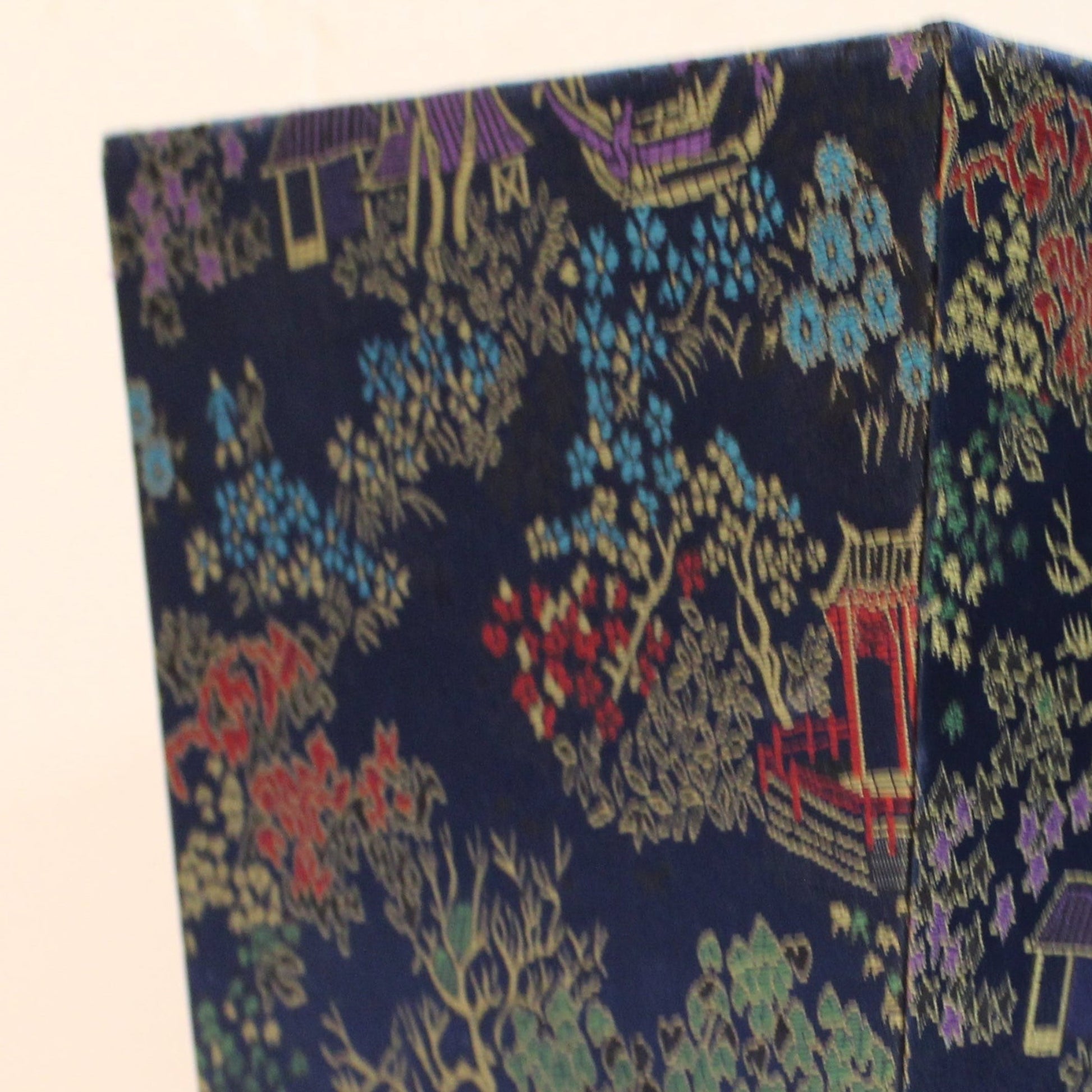 Navy blue Chinoiserie brocade square planter. 