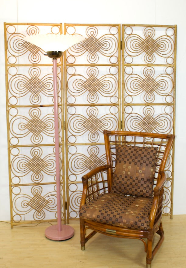 Natural Rattan Cane Privacy Screen with Rattan Chair and Pink Floor Lamp.