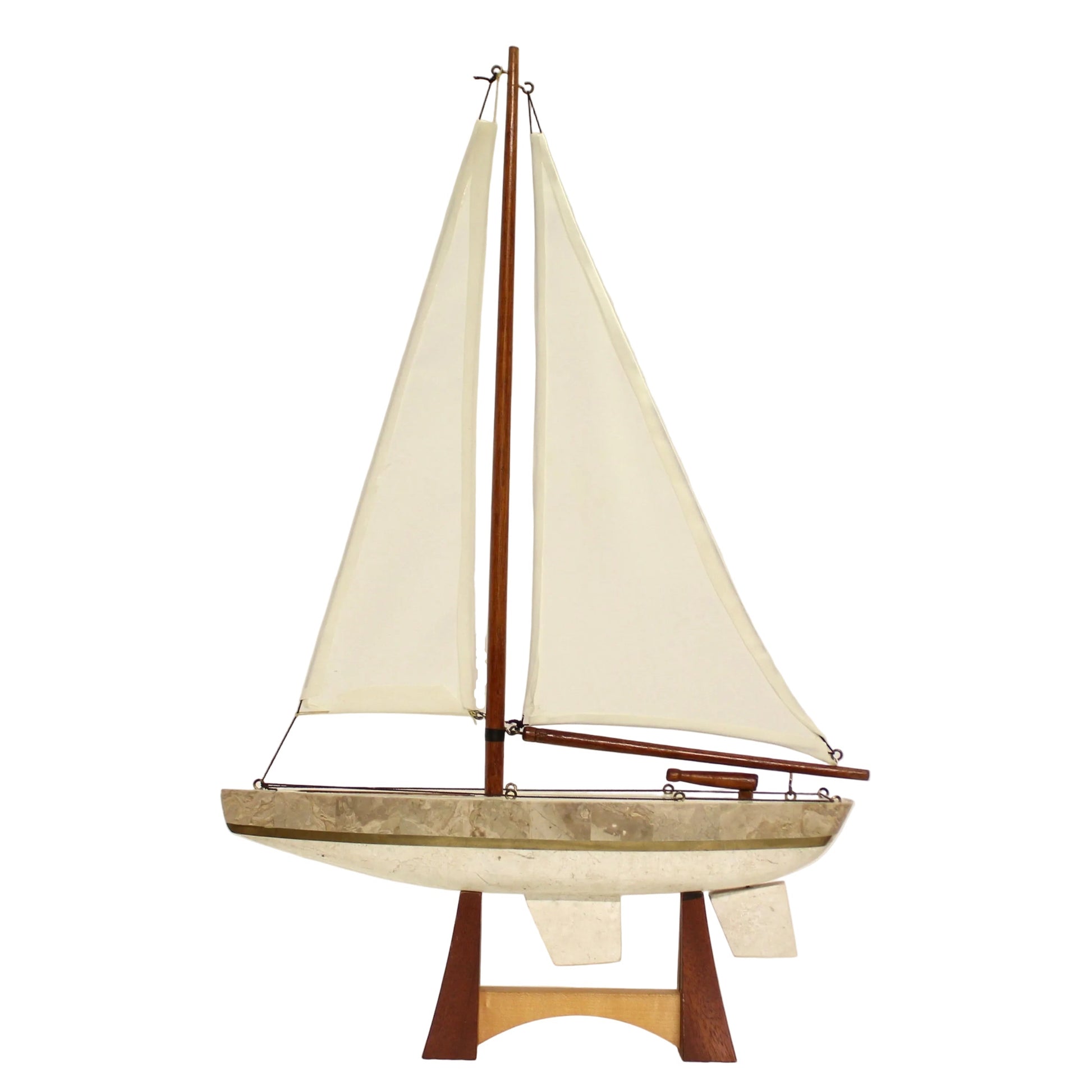 Nautical sailboat sculpture of tessellated stone. 