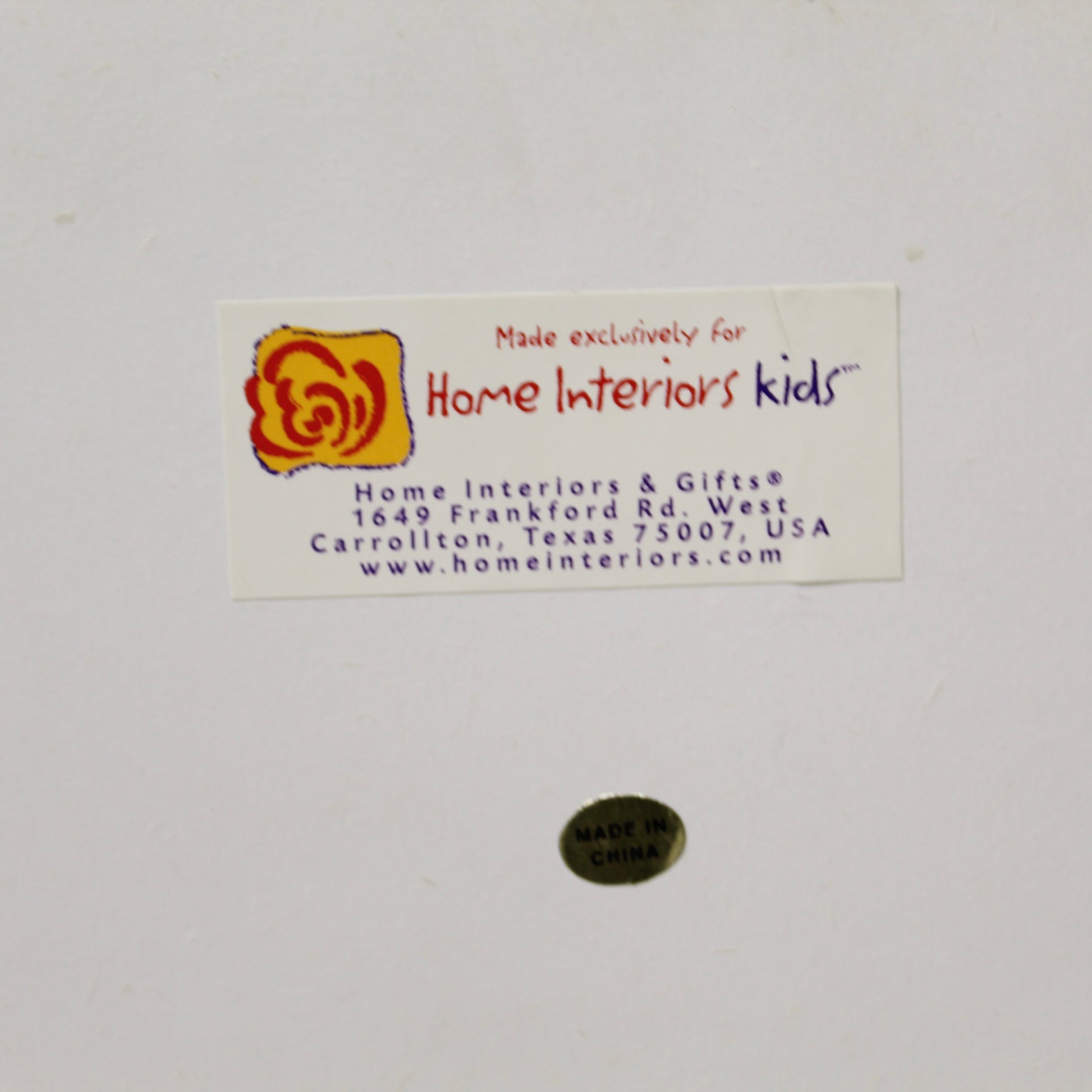 Label for Home Interiors & Gifts with contact information on a white background