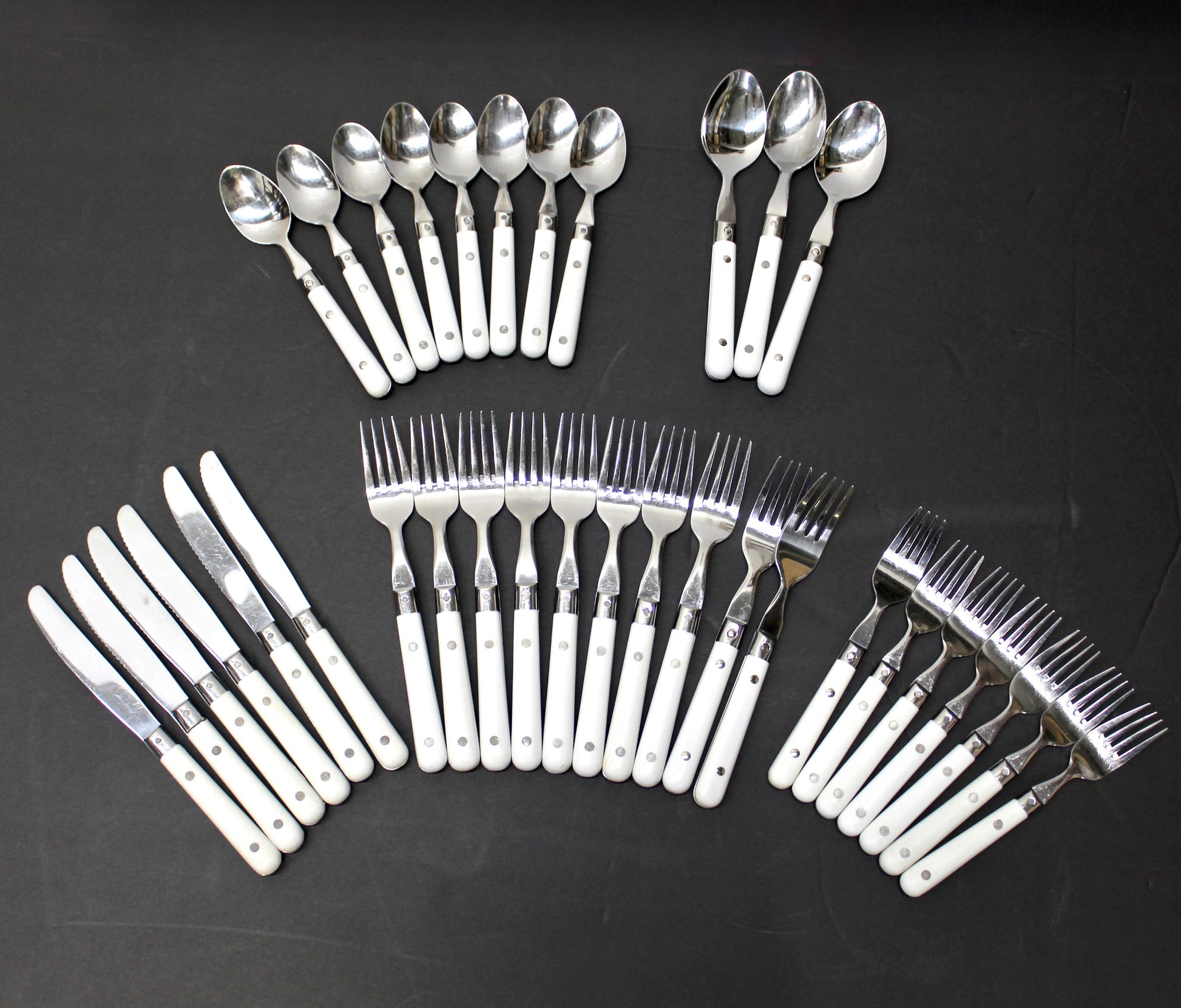 34 pc. Vintage White Riveted Handle Flatware