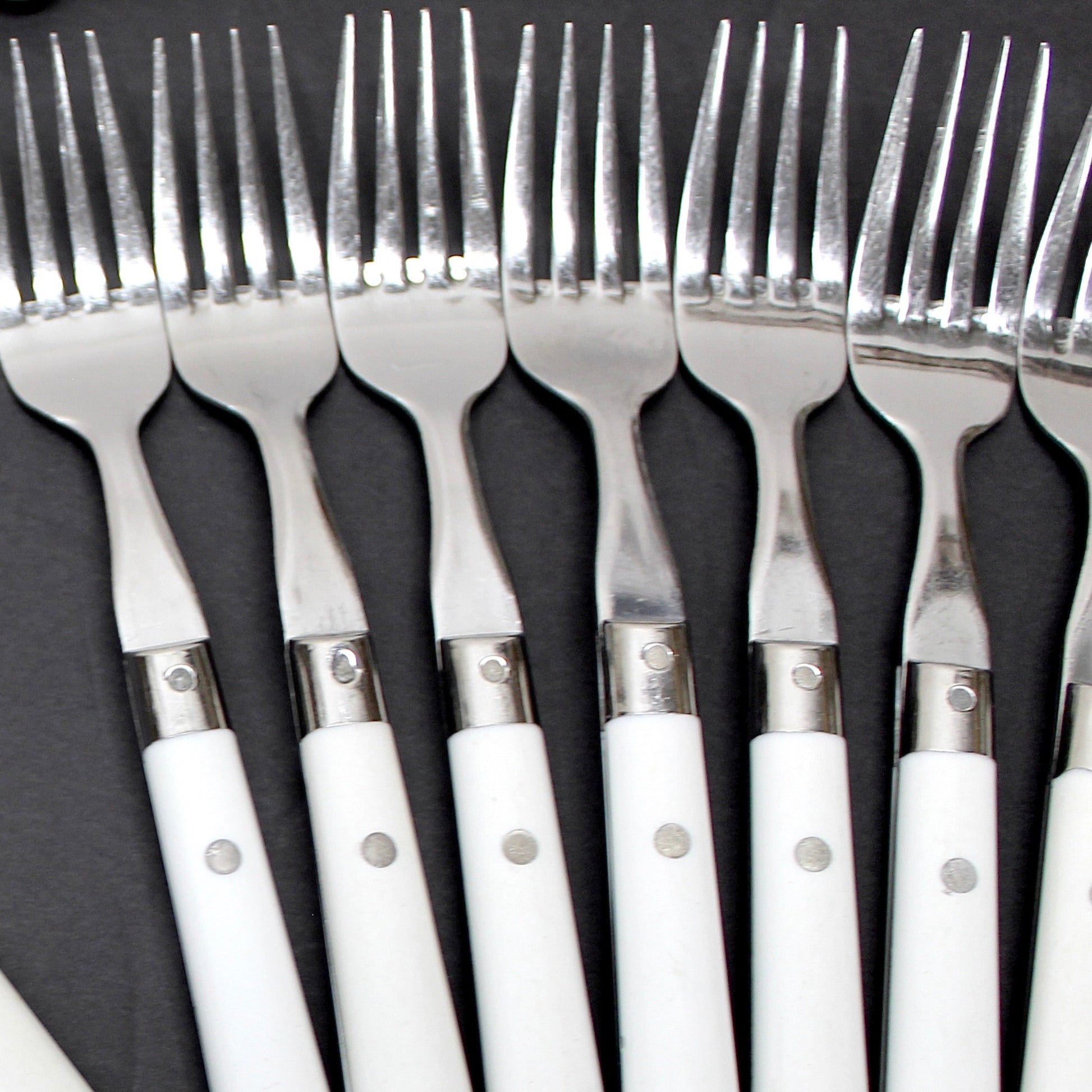 34 pc. Vintage White Riveted Handle Flatware
