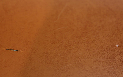 Retro Burnt Orange & Mableized Cream Vinly Hassock