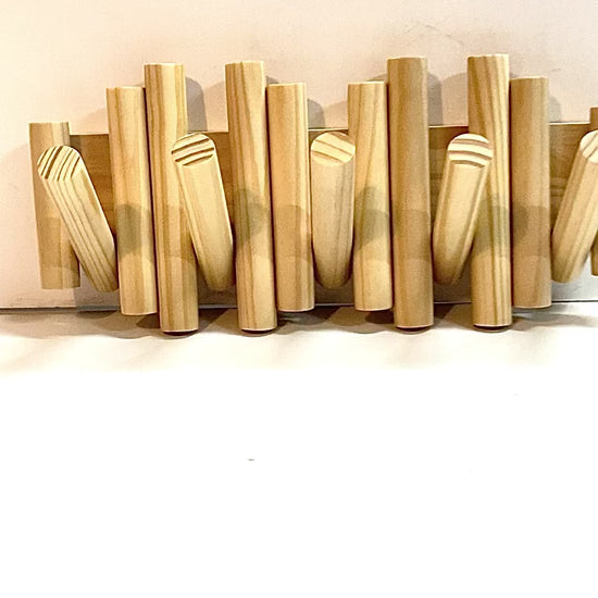 Picket Rail Coat Rack. Fold the 5 pickets up or down for convenience.
